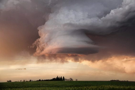 Rapidly rotating narrow mesocyclone spinning over open field at sunset, sidney, nebraska, usa