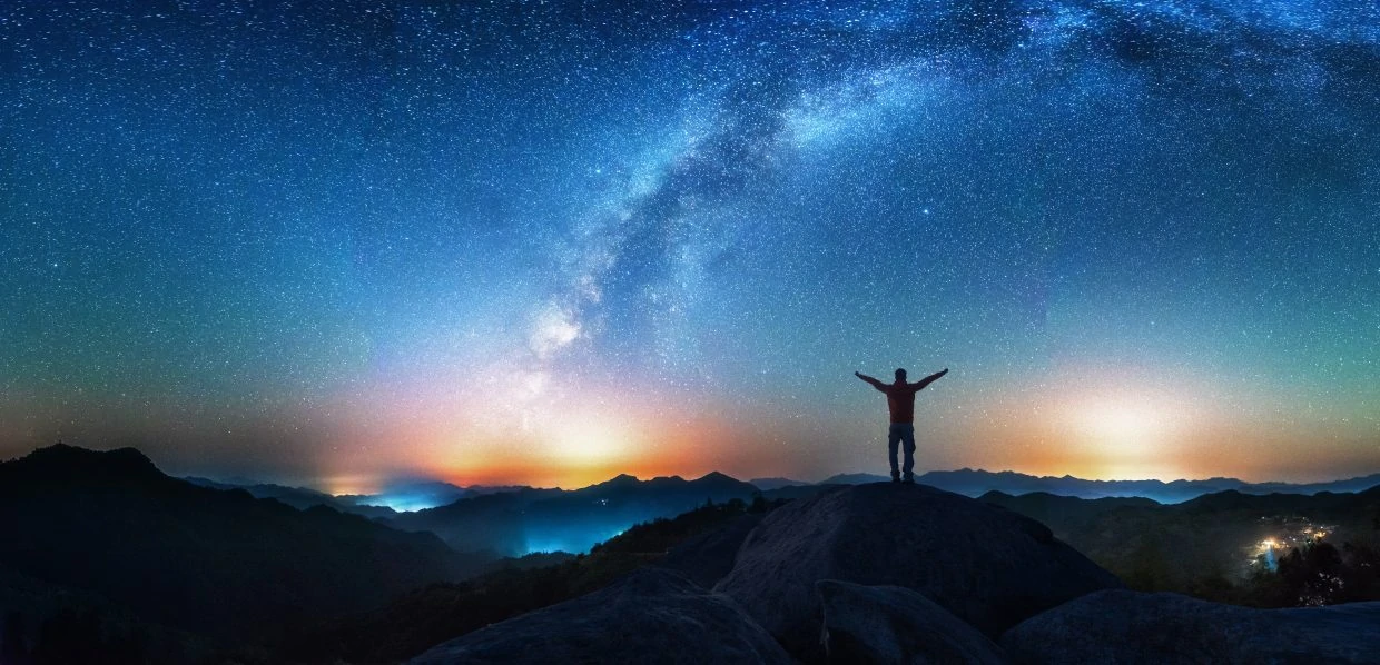 Man looking up the milky way
