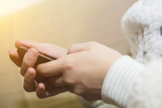Woman using her mobile phone