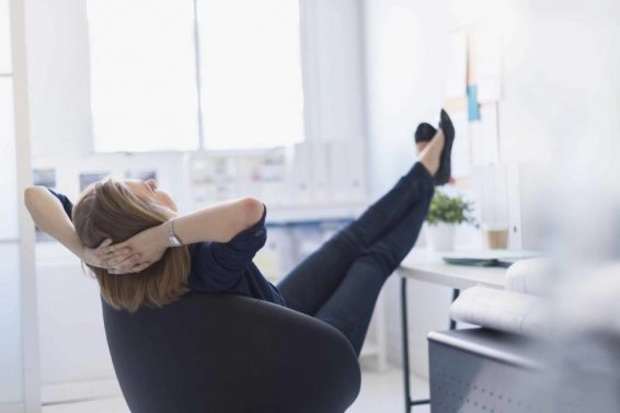 Usa, new jersey, jersey city, business woman relaxing in office