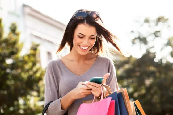 Beautiful young woman using a mobile phone