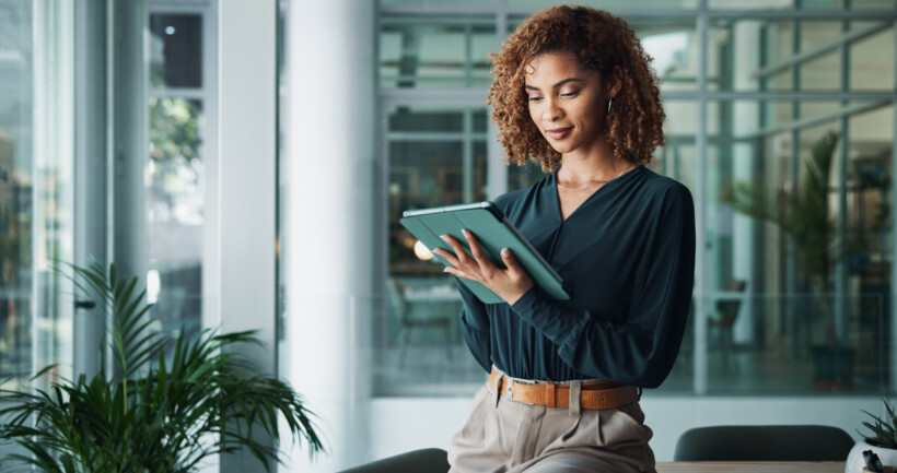 Tablet, creative woman and hands with communication, research or reading news for publishing in startup office. digital technology, manager and planning business project, review and problem solving