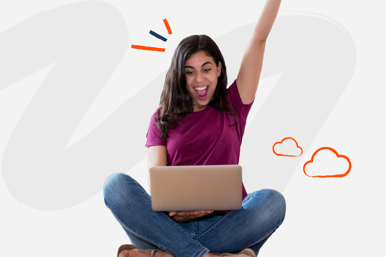Cheering arabic woman with computer