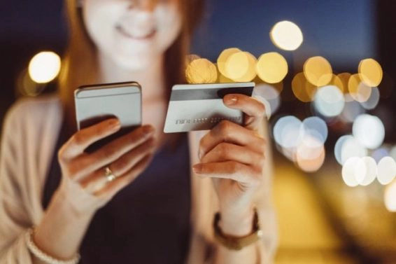Girl shopping online with credit card