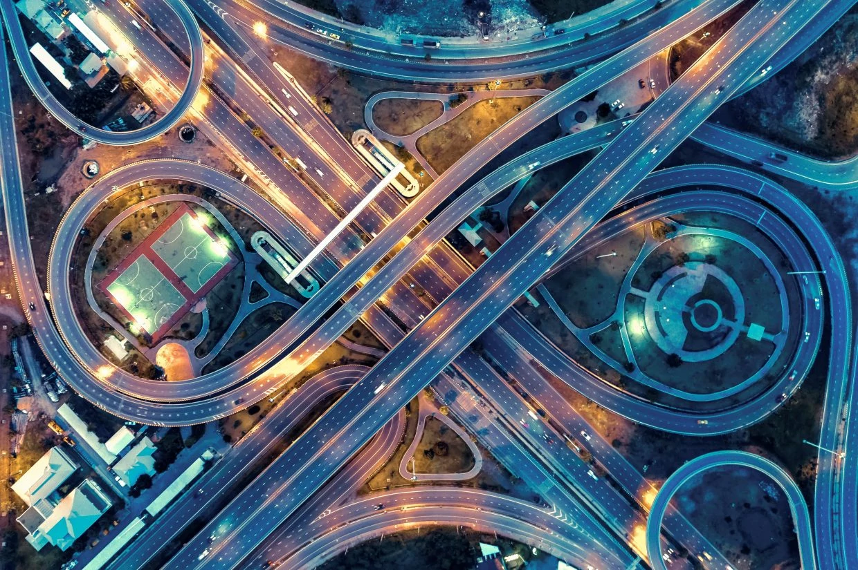 Aerial view, expressway road intersection, traffic in bangkok at night, thailand.