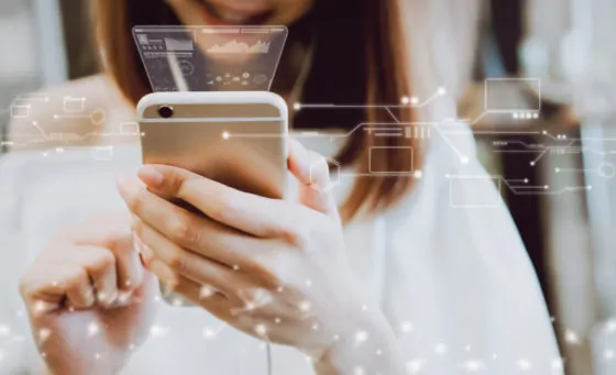 Women using a smartphone in the display and technology advances in stores. take your screen to put on advertising.