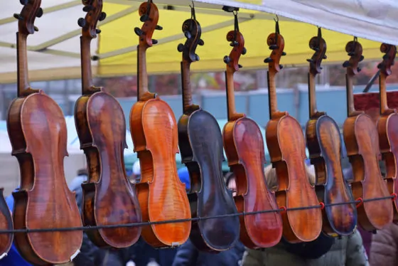 Close up of violins at market