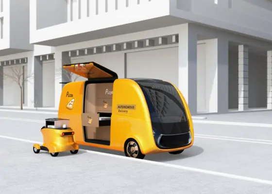 Self driving pizza delivery van and drone in the street