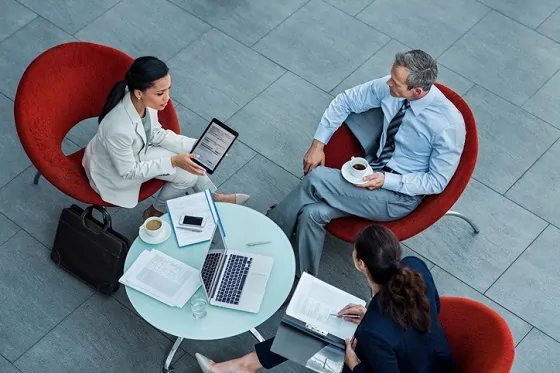 Businesspeople discussing strategy in office