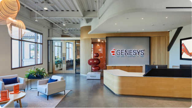 Genesys office reception area with lounge seating and branded signage