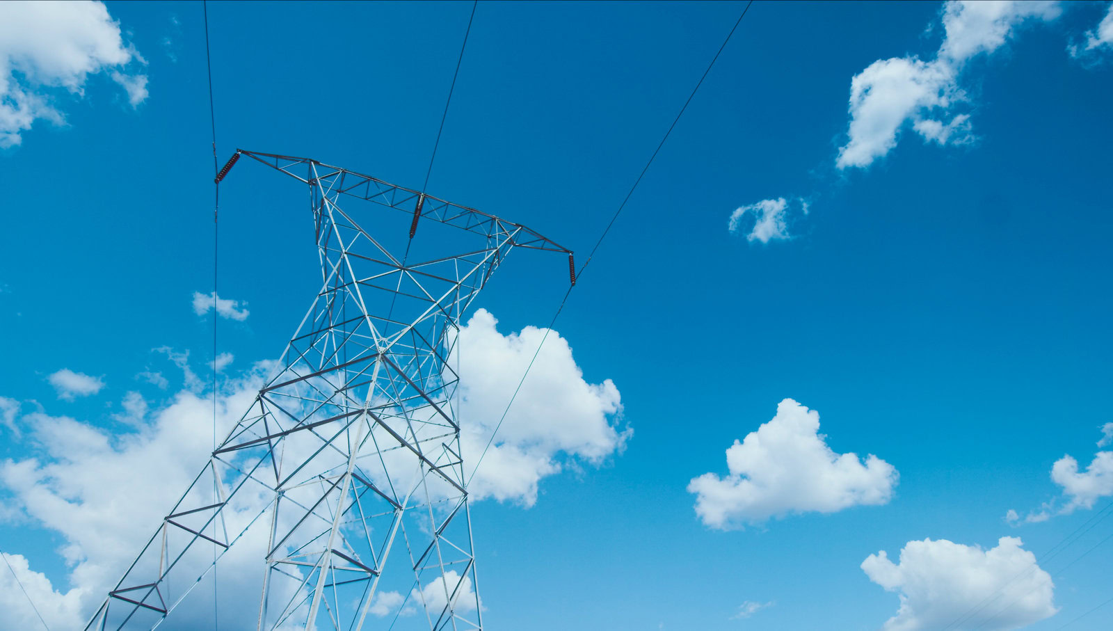 Electrical tower surrounded by sky