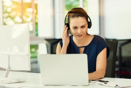 Young business woman in video conference at the modern office